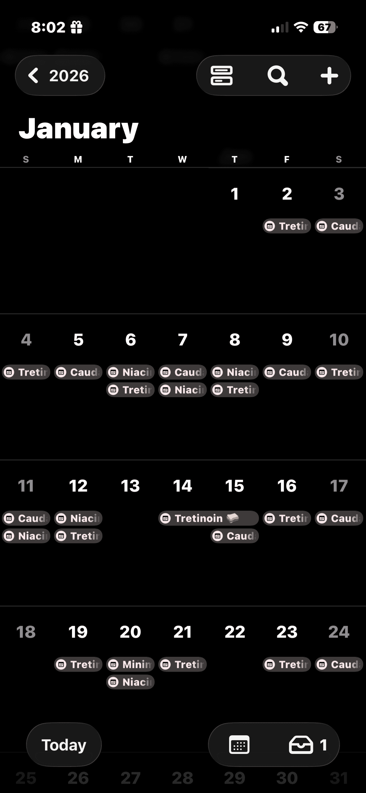 Calendar monthly view in dark mode showing skincare entries
